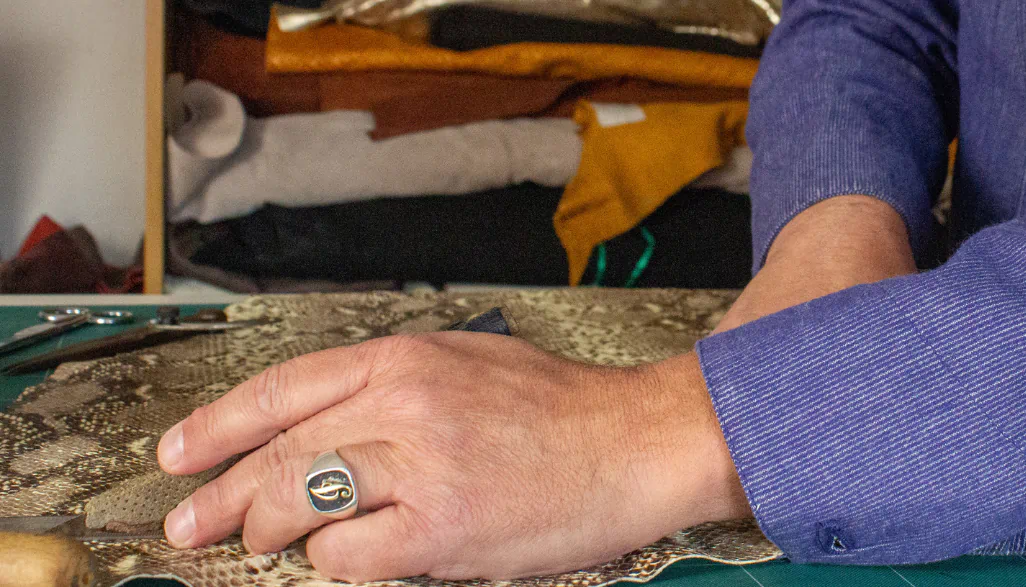 Close view of leather being handled and prepared in the QUOYO atelier